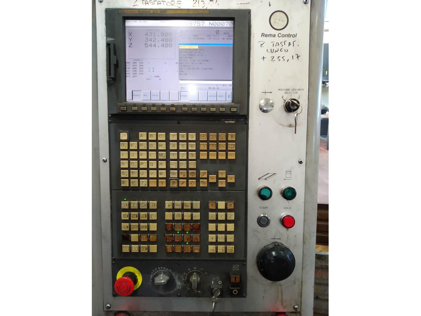 Centro di lavoro verticale a montante mobile. Newton RCV 1.8 CNC FANUC 21iM – REMA CONTROL
